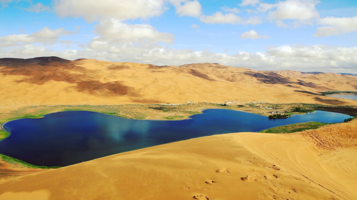 Badain Jaran Desert - A World Natural Heritage in the Sand Sea